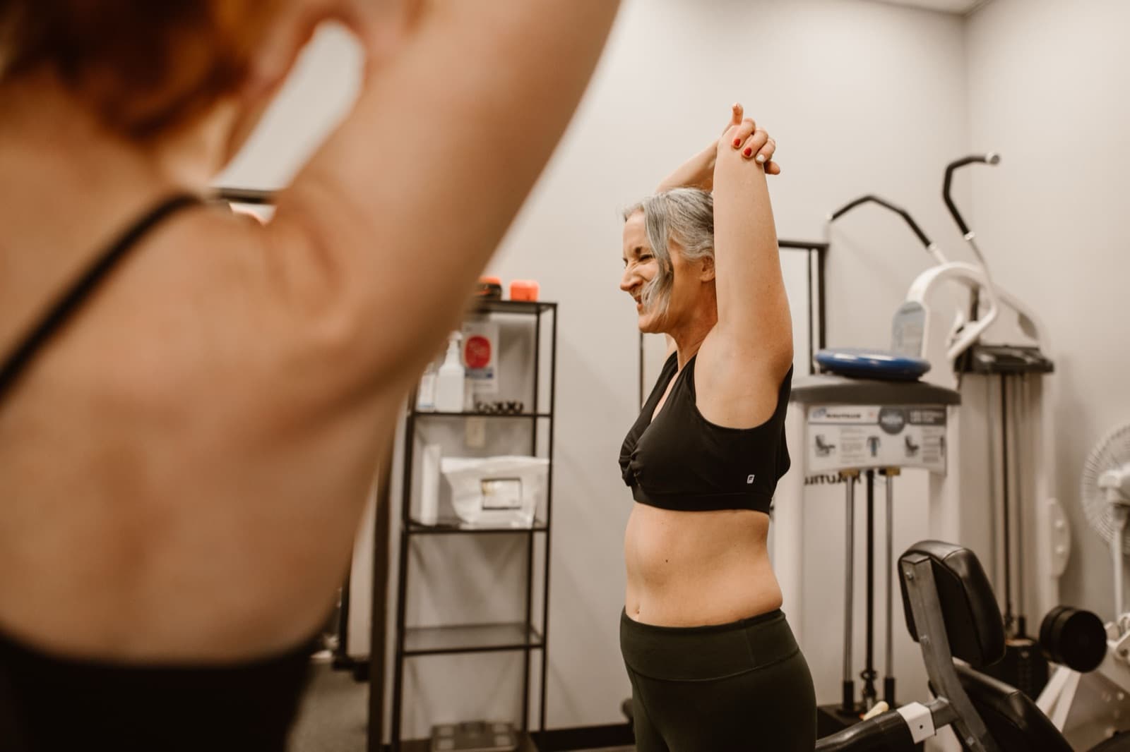 Woman over 50 exercising, looking active and confident